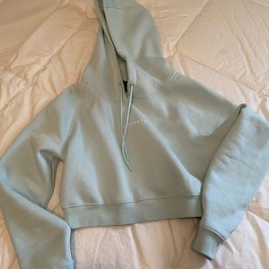 Alphalete cropped light blue hoodie